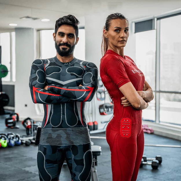 a woman and a man, both personal trainers